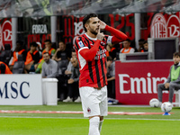 Theo Hernandez celebrates after scoring a goal during the Serie A football match between AC Milan and Venezia FC in Milano, Italy, on Septem...