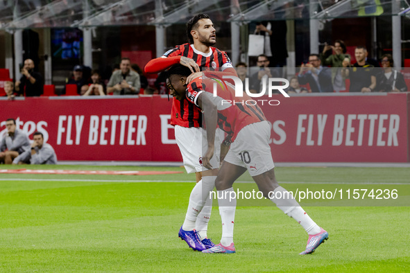 Theo Hernandez and Rafael Leao celebrate after scoring a goal during the Serie A football match between AC Milan and Venezia FC in Milano, I...