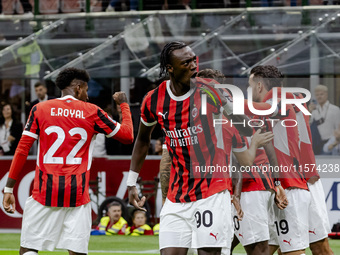 Tammy Abraham celebrates after scoring a goal during the Serie A football match between AC Milan and Venezia FC in Milano, Italy, on Septemb...