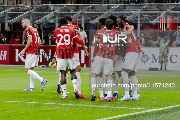 Theo Hernandez celebrates after scoring a goal during the Serie A football match between AC Milan and Venezia FC in Milano, Italy, on Septem...