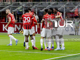 Theo Hernandez celebrates after scoring a goal during the Serie A football match between AC Milan and Venezia FC in Milano, Italy, on Septem...