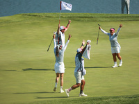 GAINESVILLE, VIRGINIA - SEPTEMBER 14: Megan Khang of the United States celebrates her putt on the 11th with teammates during Fourball Matche...