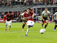 Christian Pulisic plays during the Serie A match between AC Milan and Venezia FC in Milano, Italy, on September 14, 2024, at Stadio Giuseppe...