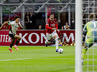 Theo Hernandez plays during the Serie A match between AC Milan and Venezia FC in Milano, Italy, on September 14, 2024, at Stadio Giuseppe Me...