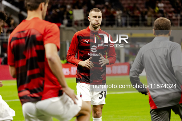 Strahinja Pavlovic is in action during the Serie A match between AC Milan and Venezia FC in Milano, Italy, on September 14, 2024, at Stadio...