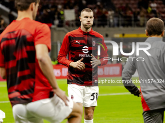 Strahinja Pavlovic is in action during the Serie A match between AC Milan and Venezia FC in Milano, Italy, on September 14, 2024, at Stadio...