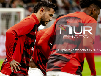 Theo Hernandez plays during the Serie A match between AC Milan and Venezia FC in Milano, Italy, on September 14, 2024, at Stadio Giuseppe Me...