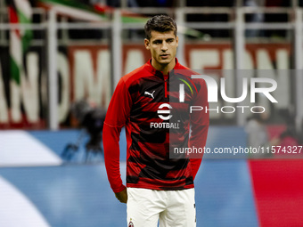 Alvaro Morata plays during the Serie A match between AC Milan and Venezia FC in Milano, Italy, on September 14, 2024, at Stadio Giuseppe Mea...