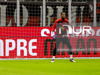 Mike Maignan is in action during the Serie A match between AC Milan and Venezia FC in Milano, Italy, on September 14, 2024, at Stadio Giusep...