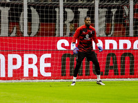 Mike Maignan is in action during the Serie A match between AC Milan and Venezia FC in Milano, Italy, on September 14, 2024, at Stadio Giusep...