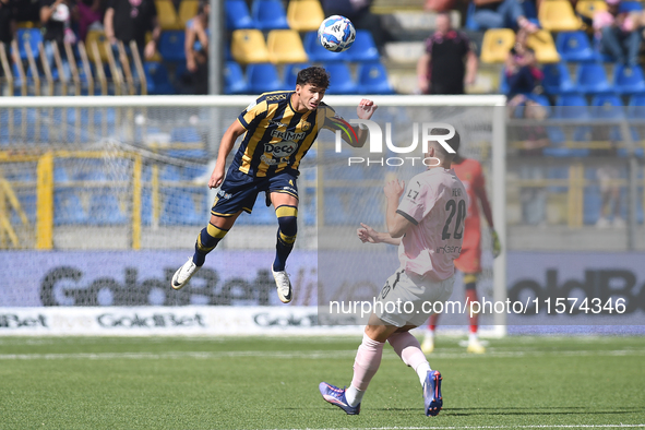 Marco Ruggero of SS Juve Stabia  competes for the ball with Thomas Henry of Palermo FC during the Serie B match between SS Juve Stabia and P...