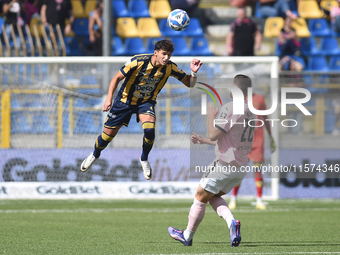 Marco Ruggero of SS Juve Stabia  competes for the ball with Thomas Henry of Palermo FC during the Serie B match between SS Juve Stabia and P...