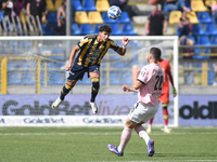 Marco Ruggero of SS Juve Stabia  competes for the ball with Thomas Henry of Palermo FC during the Serie B match between SS Juve Stabia and P...