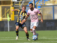 Marco Bellich of SS Juve Stabia competes for the ball with Roberto Insigne of Palermo FC during the Serie B match between SS Juve Stabia and...