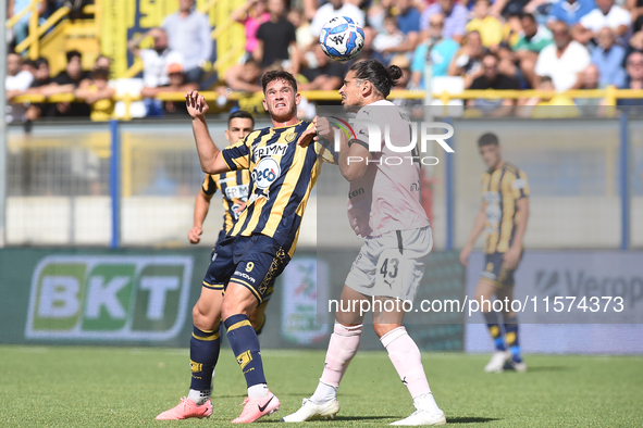 Dimitris Nikolaou of Palermo FC competes for the ball with Andrea Adorante of SS Juve Stabia during the Serie B match between SS Juve Stabia...