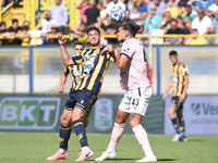 Dimitris Nikolaou of Palermo FC competes for the ball with Andrea Adorante of SS Juve Stabia during the Serie B match between SS Juve Stabia...