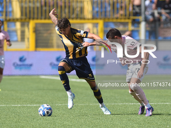 Niccolo Pierozzi of Palermo FC competes for the ball with Romano Floriani of SS Juve Stabia during the Serie B match between SS Juve Stabia...