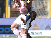 Thomas Henry of Palermo FC competes for the ball with Marco Ruggero of SS Juve Stabia during the Serie B match between SS Juve Stabia and Pa...