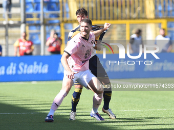 Thomas Henry of Palermo FC competes for the ball with Marco Ruggero of SS Juve Stabia during the Serie B match between SS Juve Stabia and Pa...