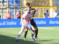 Thomas Henry of Palermo FC competes for the ball with Marco Ruggero of SS Juve Stabia during the Serie B match between SS Juve Stabia and Pa...