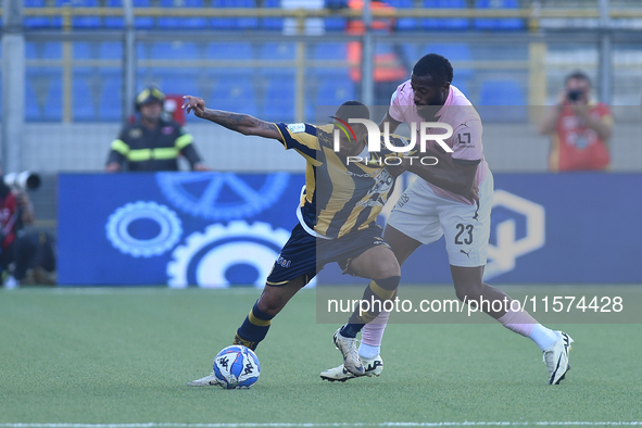 Kevin Piscopo of SS Juve Stabia competes for the ball with Salim Diakite of Palermo FC during the Serie B match between SS Juve Stabia and P...