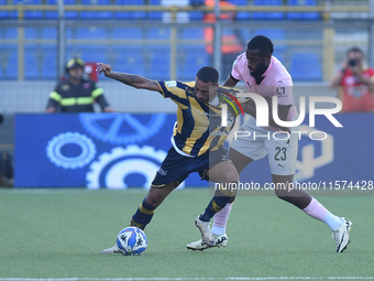 Kevin Piscopo of SS Juve Stabia competes for the ball with Salim Diakite of Palermo FC during the Serie B match between SS Juve Stabia and P...