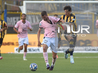 Jeremy Le Douaron of Palermo FC competes for the ball with Romano Floriani Mussolini of SS Juve Stabia during the Serie B match between SS J...