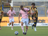 Jeremy Le Douaron of Palermo FC competes for the ball with Romano Floriani Mussolini of SS Juve Stabia during the Serie B match between SS J...