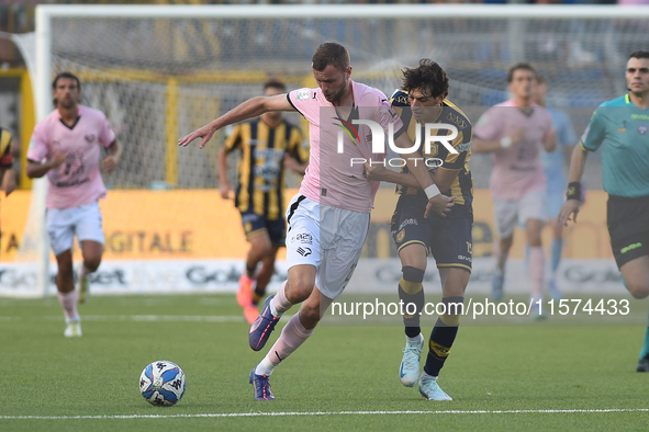 Jeremy Le Douaron of Palermo FC competes for the ball with Romano Floriani Mussolini of SS Juve Stabia during the Serie B match between SS J...