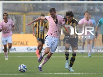 Jeremy Le Douaron of Palermo FC competes for the ball with Romano Floriani Mussolini of SS Juve Stabia during the Serie B match between SS J...