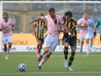 Jeremy Le Douaron of Palermo FC competes for the ball with Romano Floriani Mussolini of SS Juve Stabia during the Serie B match between SS J...