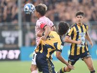 Jacopo Segre of Palermo FC competes for the ball with Giuseppe Leone of SS Juve Stabia during the Serie B match between SS Juve Stabia and P...