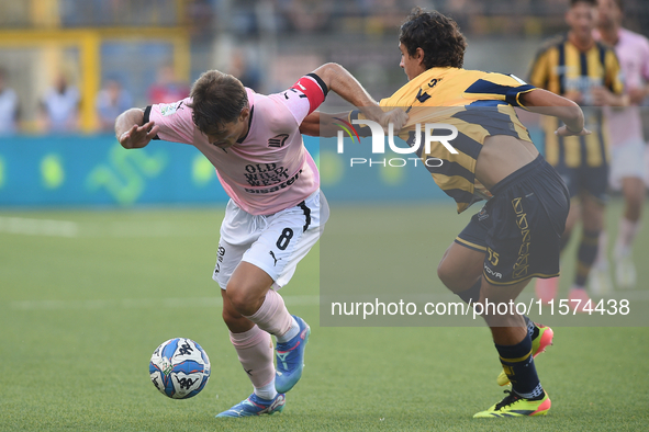 Jacopo Segre of Palermo FC competes for the ball with Giuseppe Leone of SS Juve Stabia during the Serie B match between SS Juve Stabia and P...