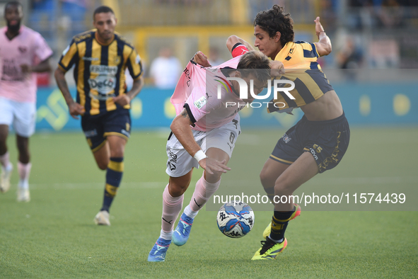 Jacopo Segre of Palermo FC competes for the ball with Giuseppe Leone of SS Juve Stabia during the Serie B match between SS Juve Stabia and P...