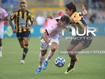 Jacopo Segre of Palermo FC competes for the ball with Giuseppe Leone of SS Juve Stabia during the Serie B match between SS Juve Stabia and P...