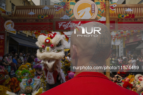 Members of the Chinese community in Sao Paulo, Brazil, gather in the city center to celebrate the Mid-Autumn Festival, an important cultural...