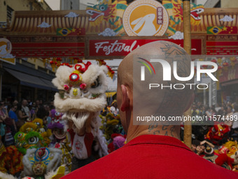 Members of the Chinese community in Sao Paulo, Brazil, gather in the city center to celebrate the Mid-Autumn Festival, an important cultural...