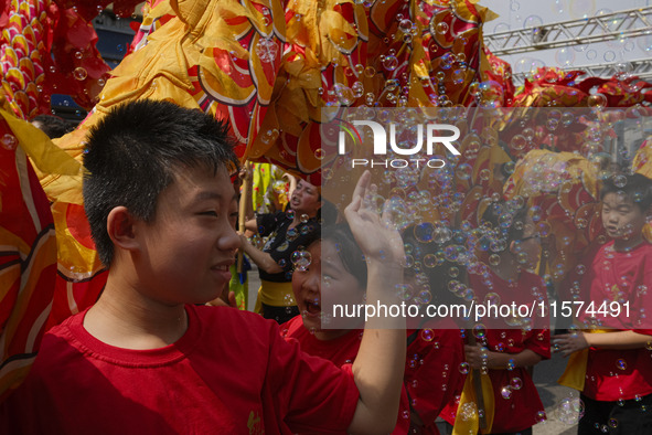 Members of the Chinese community in Sao Paulo, Brazil, gather in the city center to celebrate the Mid-Autumn Festival, an important cultural...