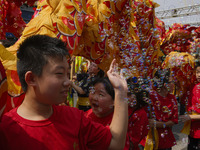 Members of the Chinese community in Sao Paulo, Brazil, gather in the city center to celebrate the Mid-Autumn Festival, an important cultural...