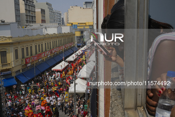 Members of the Chinese community in Sao Paulo, Brazil, gather in the city center to celebrate the Mid-Autumn Festival, an important cultural...