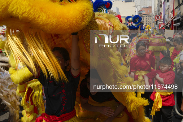 Members of the Chinese community in Sao Paulo, Brazil, gather in the city center to celebrate the Mid-Autumn Festival, an important cultural...