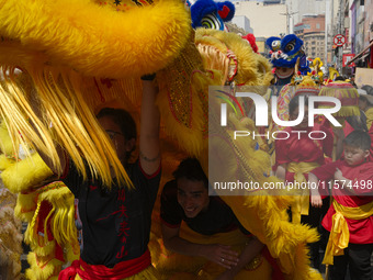 Members of the Chinese community in Sao Paulo, Brazil, gather in the city center to celebrate the Mid-Autumn Festival, an important cultural...