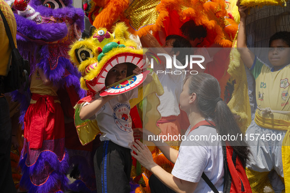 Members of the Chinese community in Sao Paulo, Brazil, gather in the city center to celebrate the Mid-Autumn Festival, an important cultural...