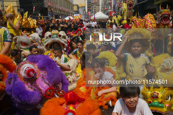 Members of the Chinese community in Sao Paulo, Brazil, gather in the city center to celebrate the Mid-Autumn Festival, an important cultural...