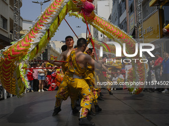 Members of the Chinese community in Sao Paulo, Brazil, gather in the city center to celebrate the Mid-Autumn Festival, an important cultural...