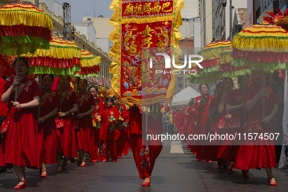 Members of the Chinese community in Sao Paulo, Brazil, gather in the city center to celebrate the Mid-Autumn Festival, an important cultural...