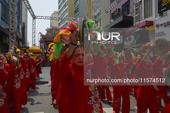 Members of the Chinese community in Sao Paulo, Brazil, gather in the city center to celebrate the Mid-Autumn Festival, an important cultural...