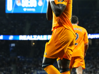 Vinicius Junior left winger of Real Madrid and Brazil celebrates after scoring his sides first goal during the La Liga match between Real So...