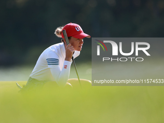 GAINESVILLE, VIRGINIA - SEPTEMBER 14: Sarah Schmelzel of the United States lines up her putt on the 11th green during Foursomes Matches on D...