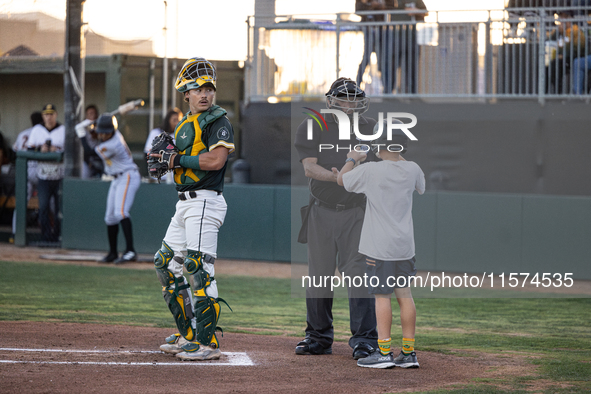 The Oakland Ballers (1) beat the Yolo High Wheelers (0) in game 2 (round 1) of the Pioneer Baseball League's playoffs in Oakland, Calif., on...